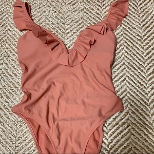 Express ruffle one piece. Medium